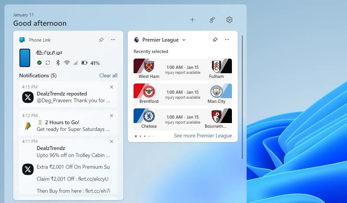 Bảng widget Windows 11 hiển thị thông tin ứng dụng Phone Link và thông báo điện thoại