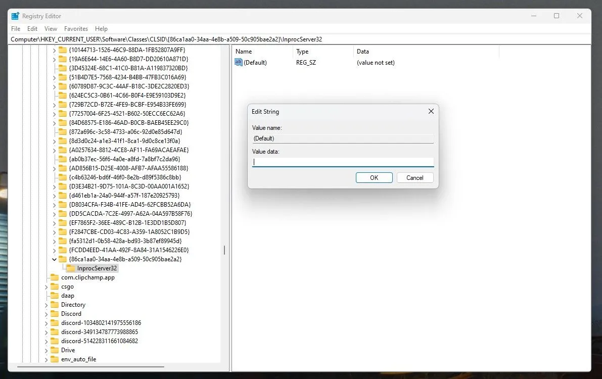Cài đặt giá trị mặc định trống cho khóa con InprocServer32 trong Registry để khôi phục menu chuột phải.