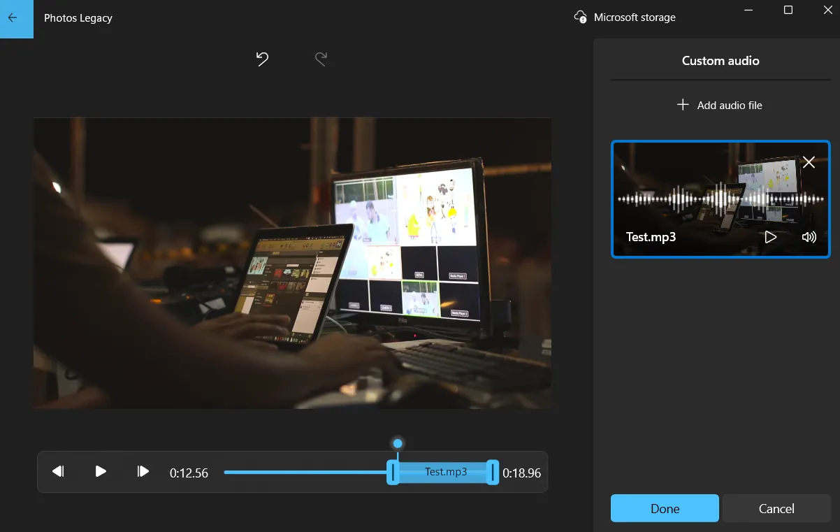 Giao diện thêm âm thanh tùy chỉnh vào video trong Photos Legacy, cho phép người dùng tải lên và điều chỉnh nhạc nền từ máy tính.