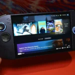 lenovo legion s handheld front view in hand with award badge