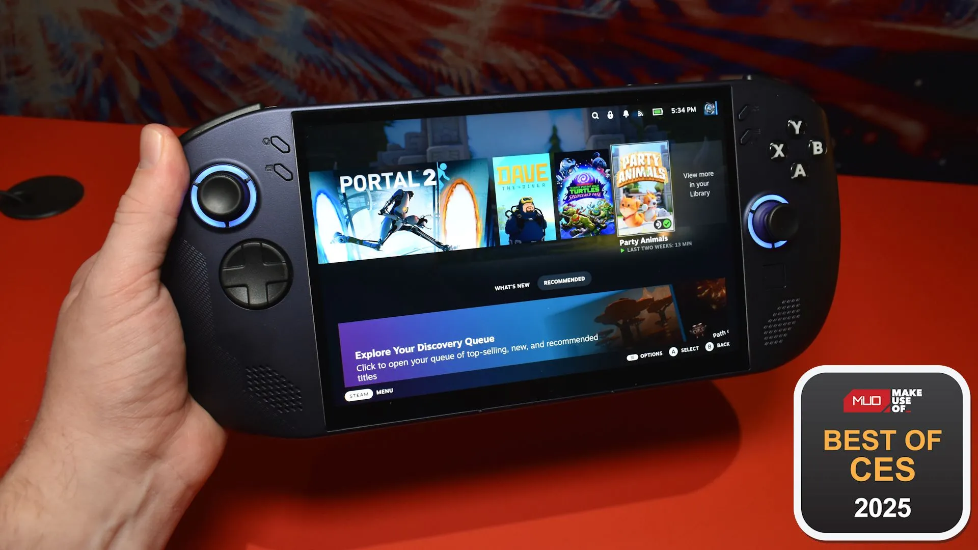lenovo legion s handheld front view in hand with award badge