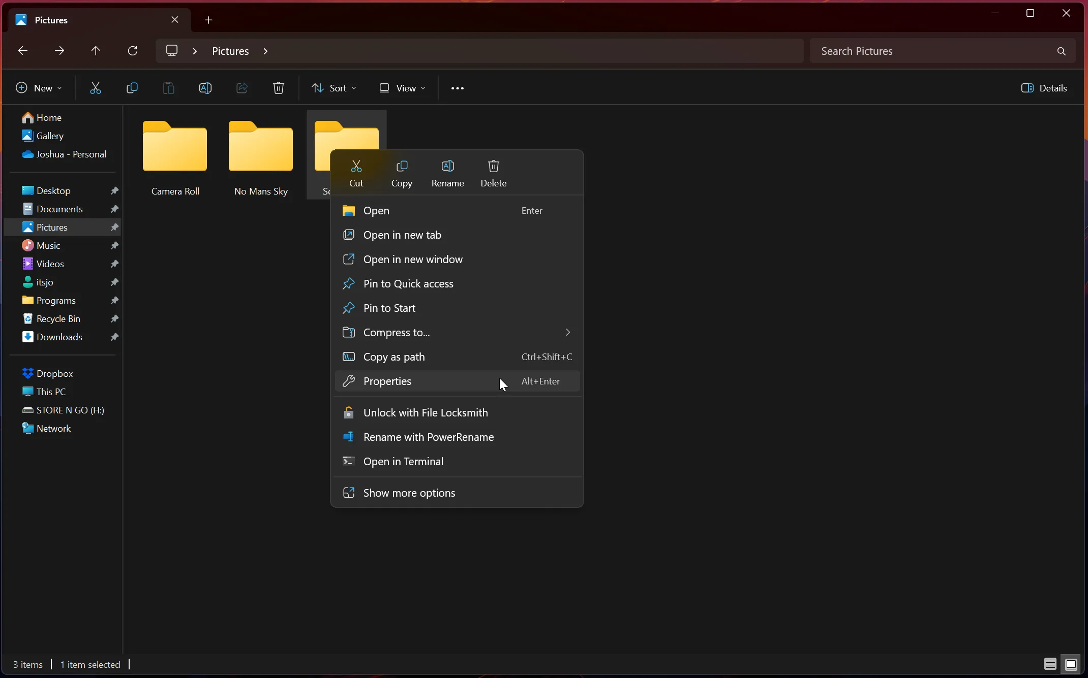 Màn hình File Explorer với con trỏ chuột di chuyển qua tùy chọn Properties trong menu chuột phải của thư mục Screenshots