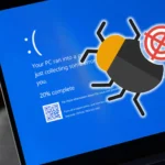 Màn hình lỗi Windows 11 với biểu tượng lỗi hệ thống màu xanh và hình ảnh con bọ, minh họa các lỗi vặt thường gặp trên Windows.