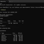 Màn hình PowerShell hiển thị danh sách các phân vùng ổ đĩa sau khi sử dụng lệnh DiskPart để quản lý ổ đĩa trên Windows.
