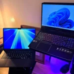 Máy tính xách tay chạy Windows 11 và macOS minh họa tốc độ khởi động nhanh của PC hiện đại với SSD