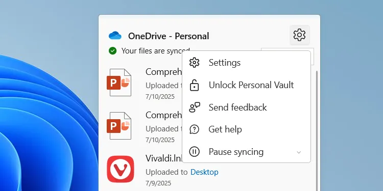 Mở cài đặt OneDrive trên máy tính Windows 11 từ khay hệ thống.