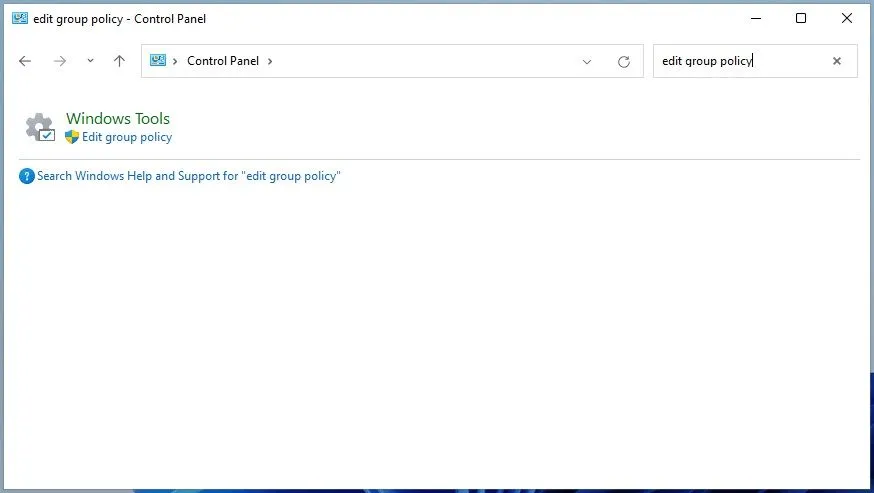 Tìm và mở Group Policy Editor trong Control Panel hoặc ứng dụng Settings