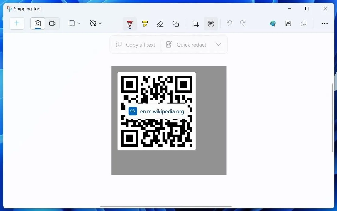 Ứng dụng Snipping Tool trên Windows 11 đang quét mã QR và hiển thị kết quả sau khi nhấn Text Actions