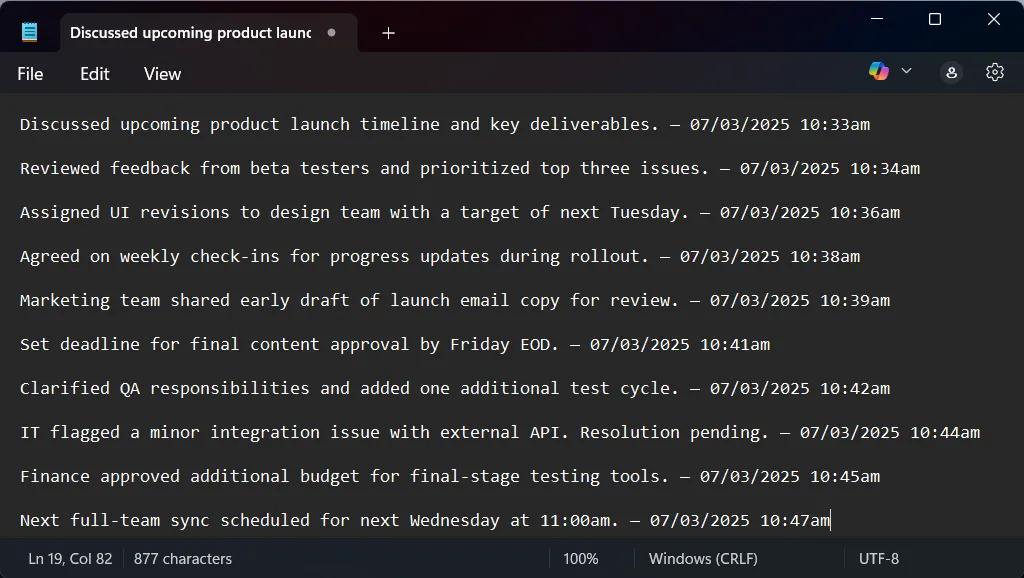 Ví dụ ghi chú cuộc họp trong Notepad với dấu thời gian tự động được chèn bằng AutoHotkey.